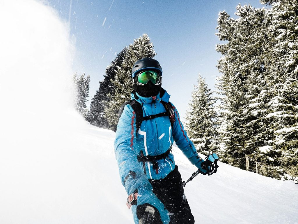 person snow skiing while taking a selfie