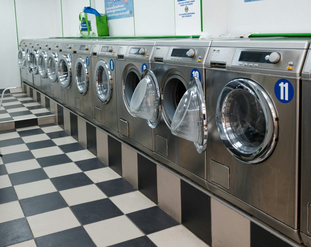 Row of washing machines in a laundromat